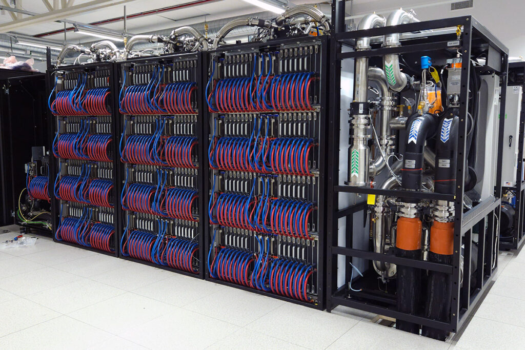Supercomputer with GPU, CPU an cooling racks with blue and red cooling tubes