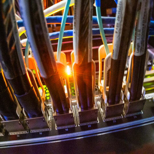 Colourful computer cables and yellow/green LEDs